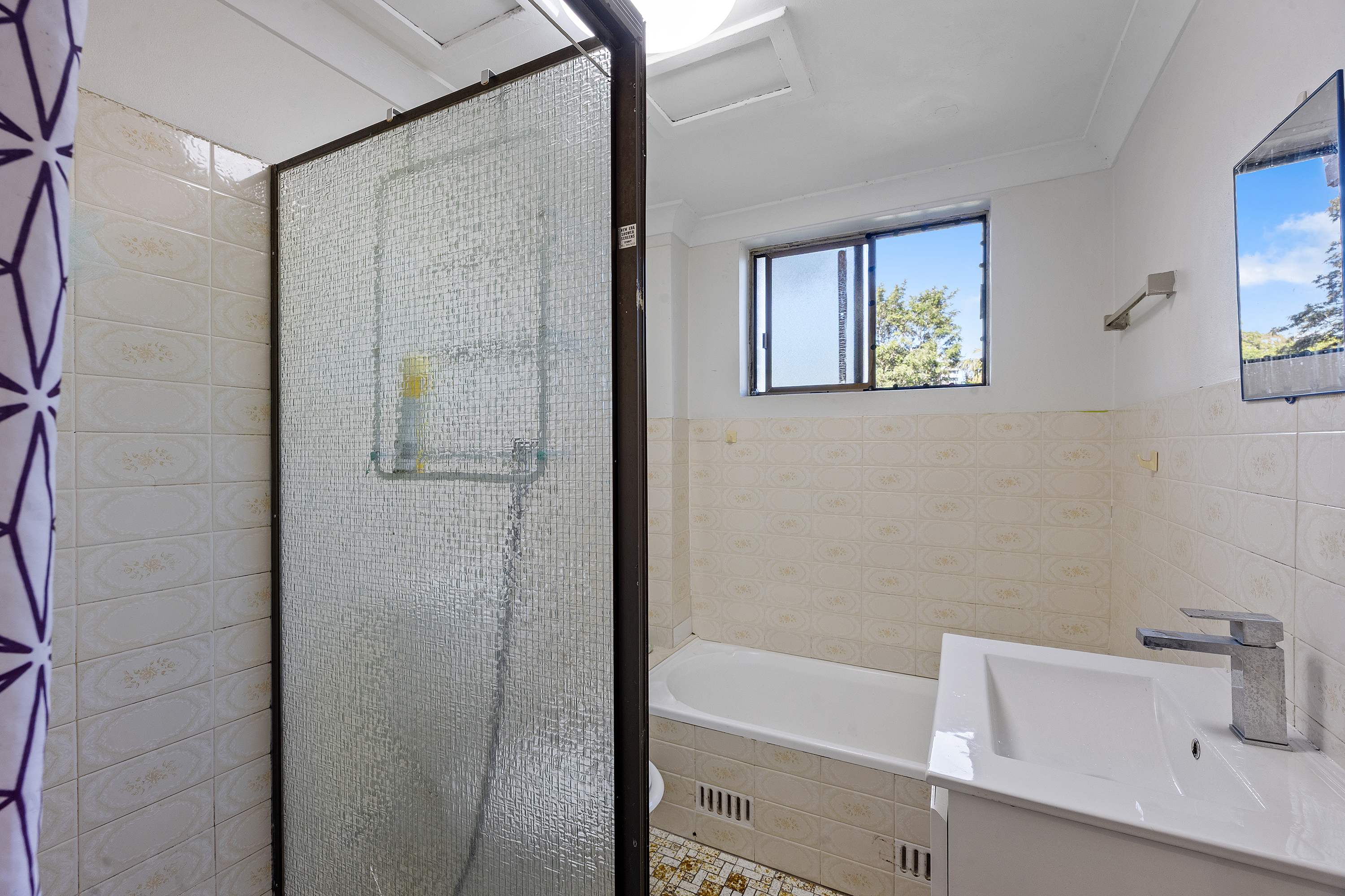 Image: Rare Full-Brick Unit with No Common Walls & Oversized Garage