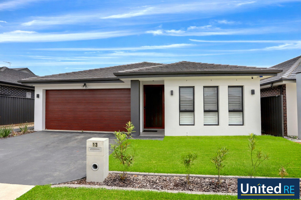 SINGLE STOREY FOUR BEDROOM FAMILY HOUSE WITH DOUBLE GARAGE