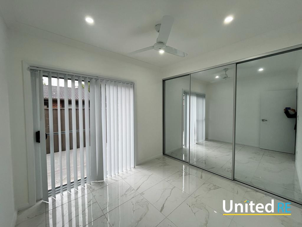 TWO BEDROOM GRANNY FLAT WITH PARKING SPACE 