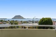 Three-level living with Mauao views